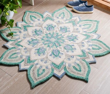 Modern multicolour living area interior room rug design.