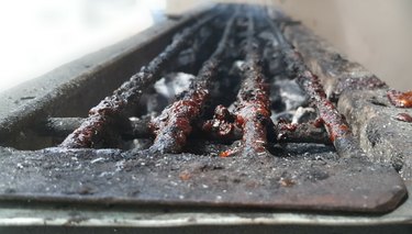 Close-Up Of Dirty Barbecue Grill