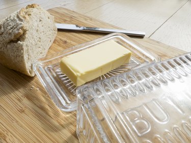 butter, butter dish and sourdough bread