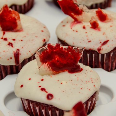 Cupcakes topped with bloody "glass" candy