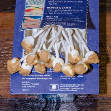 Mini marshmallow Q-tips dipped in caramel candy
