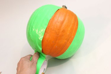 Cover the pumpkin with duct tape