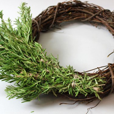 An image of overlapping herb bunches on the wreath
