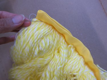 Sewing yarn to the ribbon