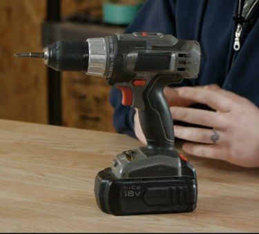 Man drilling with power tool