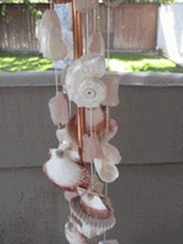 https://img.ehowcdn.com/375/cpie/images/a05/3e/6m/string-seashells-hanging-wind-chimes-1.2-800x800.jpg