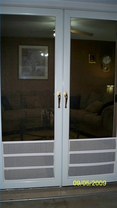 Screen door with store dog door menards