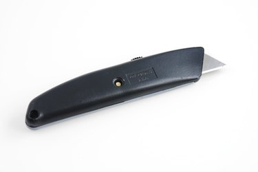 Swivel exacto store knife