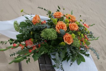 orange flower arrangement wedding