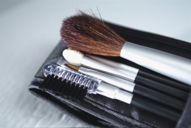 High angle view of assorted make-up brushes