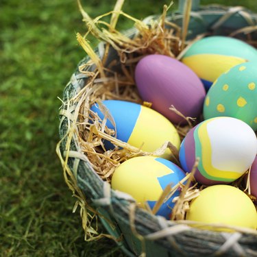 Elevated view of a basket filled with Easter eggs