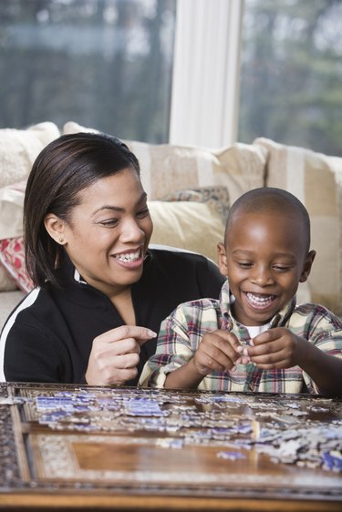 Mother and son doing a puzzle