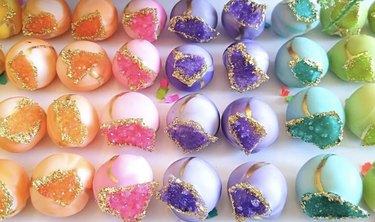 A rainbow of truffles designed to resemble sparkly geodes