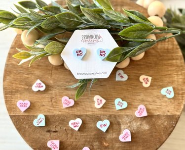 Assorted candy heart earrings with negative messages like "Um, No" and "Ew"