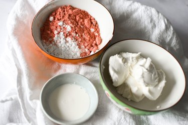 Bowls of strawberry cheesecake filling ingredients