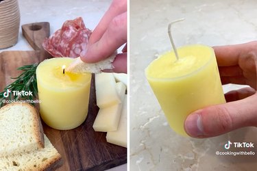 A lit butter candle paired with bread, meat and cheese and an unlit butter candle with an untrimmed wick