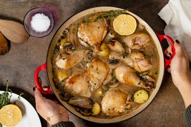 white wine chicken stew in a dutch oven