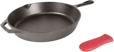 A Lodge 12-Inch Cast Iron Skillet with red silicone handle cover