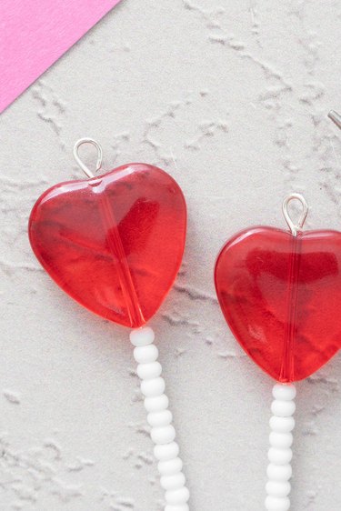 Closeup of beaded heart lollipop charms