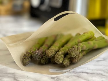 raw asparagus in a toaster bag