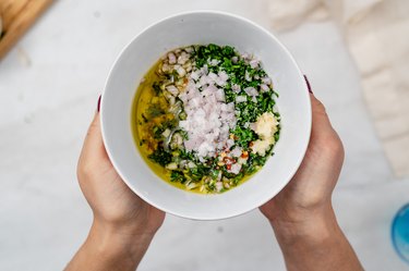 Chimichurri ingredients in a bowl