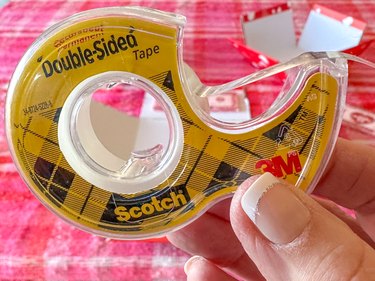 double-sided tape that you'll use to attach goodies to the inside of the exploding Valentine boxes