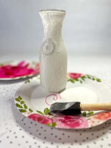 use a foam brush to cover jars with Mod Podge or white glue