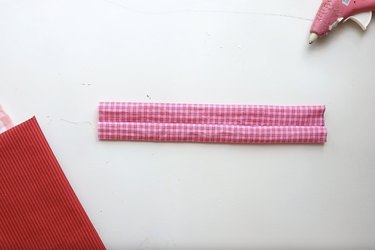 A piece of pink plaid fabric with the right side facing out