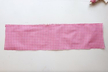 A piece of pink plaid fabric