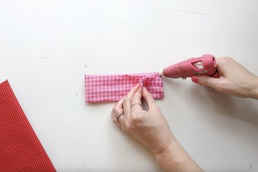 Gluing the ends of the folded fabric together