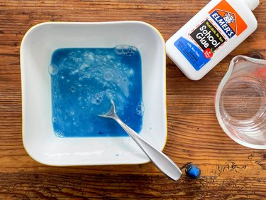 mix glue, water and food coloring