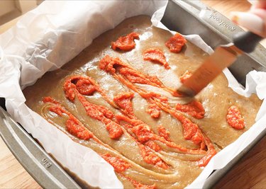 Swirling gochujang paste into blondie batter.