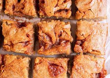 Baked gochujang blondies on top of parchment paper.