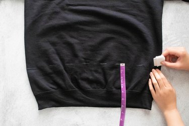 Make a dotted line on the sweatshirt with tailor's chalk