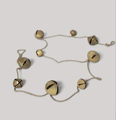 Antique gold bells on string
