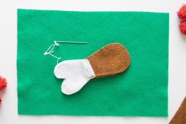 Sewing felt turkey legs for holiday slippers