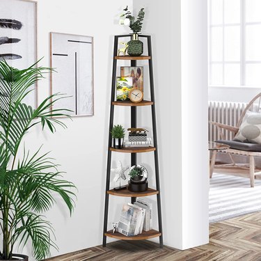 5-tier corner shelf with a black frame and wood shelves.
