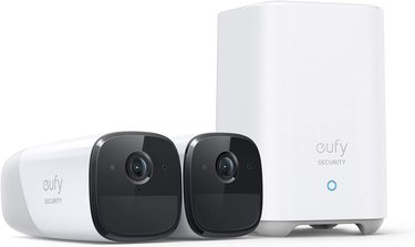 Two wireless 2K eufy camera and the local storage unit against a white background.
