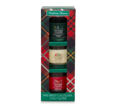 Yankee Candle Christmas Classics 3-Piece Mini Candle Set in a cardboard box with a peek-a-boo window and plaid patterns.