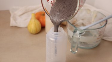 Transferring pancake batter into a squeeze bottle