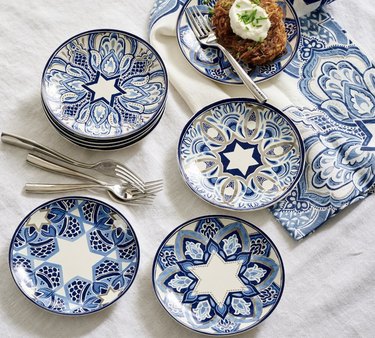 Blue and white appetizer plates on table