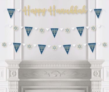 Happy Hanukkah banner over two other holiday banners