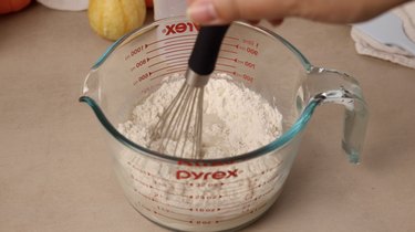 Mixing pancake batter in bowl