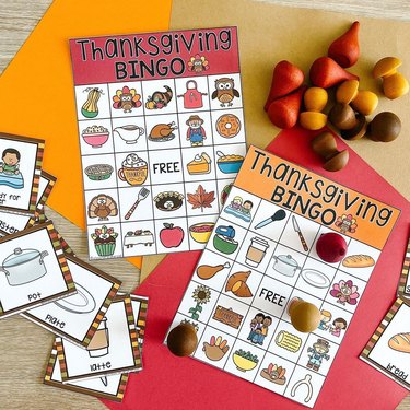 Two cards reading "Thanksgiving Bingo" with drawings of food and fall items