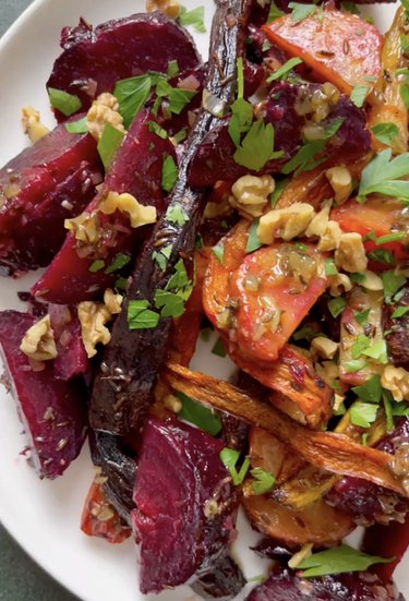 Root vegetable salad on a white plate