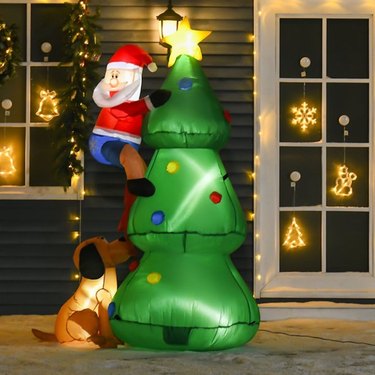 8. Hashtag Home Santa Claus Climbing Christmas Tree Inflatable