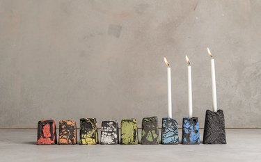 Multicolor modular pottery menorah with three white candles
