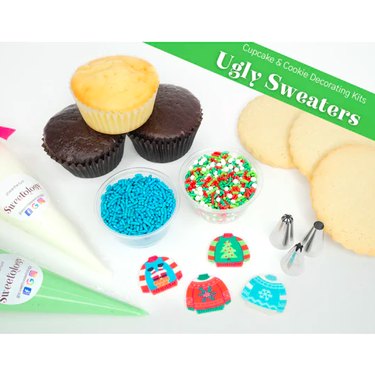 Three cupcakes and three sugar cookies with sprinkles, ugly sweater candies, and icing bags