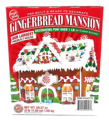 Create a Treat Gingerbread Mansion in its retail packaging, showing the fully-constructed and fully decorated gingerbread house