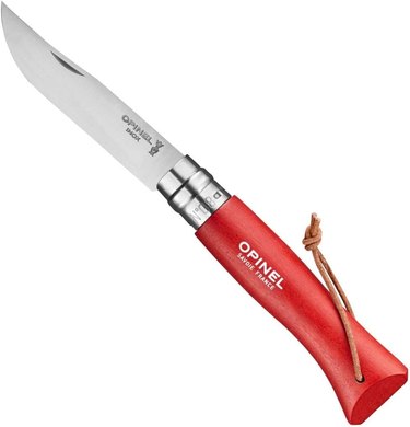 Opinel #8 knife with a red handle (from the Colorama series) shown straight against a white ground
